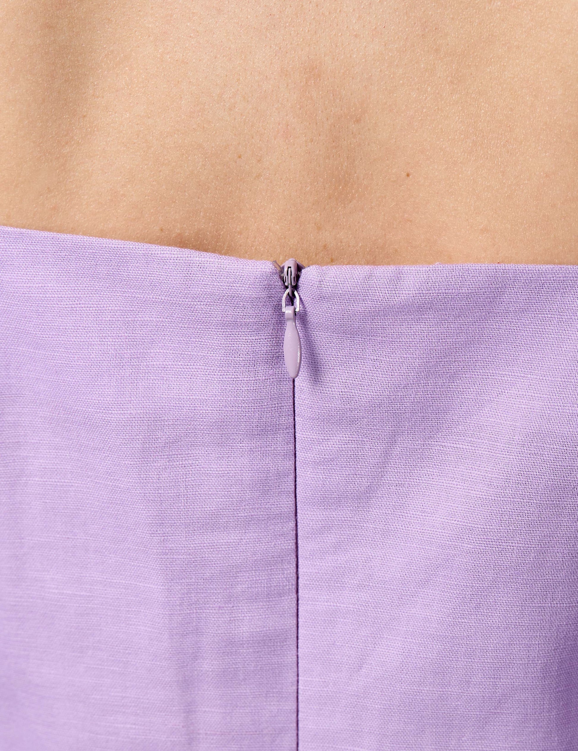 Detail of premium YKK invisible zip on a lilac 3/4 sleeve dress for a seamless luxury finish.